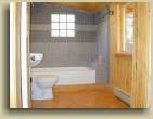 The bathroom in the Up Top log cabin