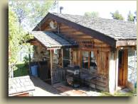 Tidey's Lodge log house at Watch Lake, in the South Cariboo, BC, Canada