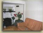 The living room in Tidey's Garden Suite